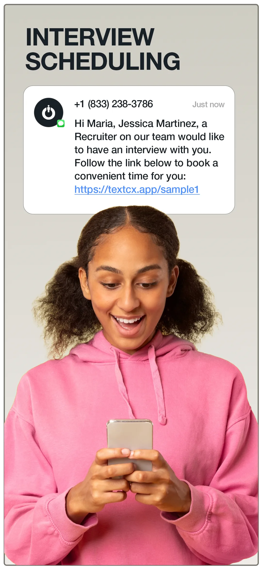 Applicant reading a text message inviting them to book an interview